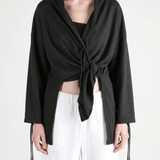 Black jackets worn by a person,showing the jackets fit