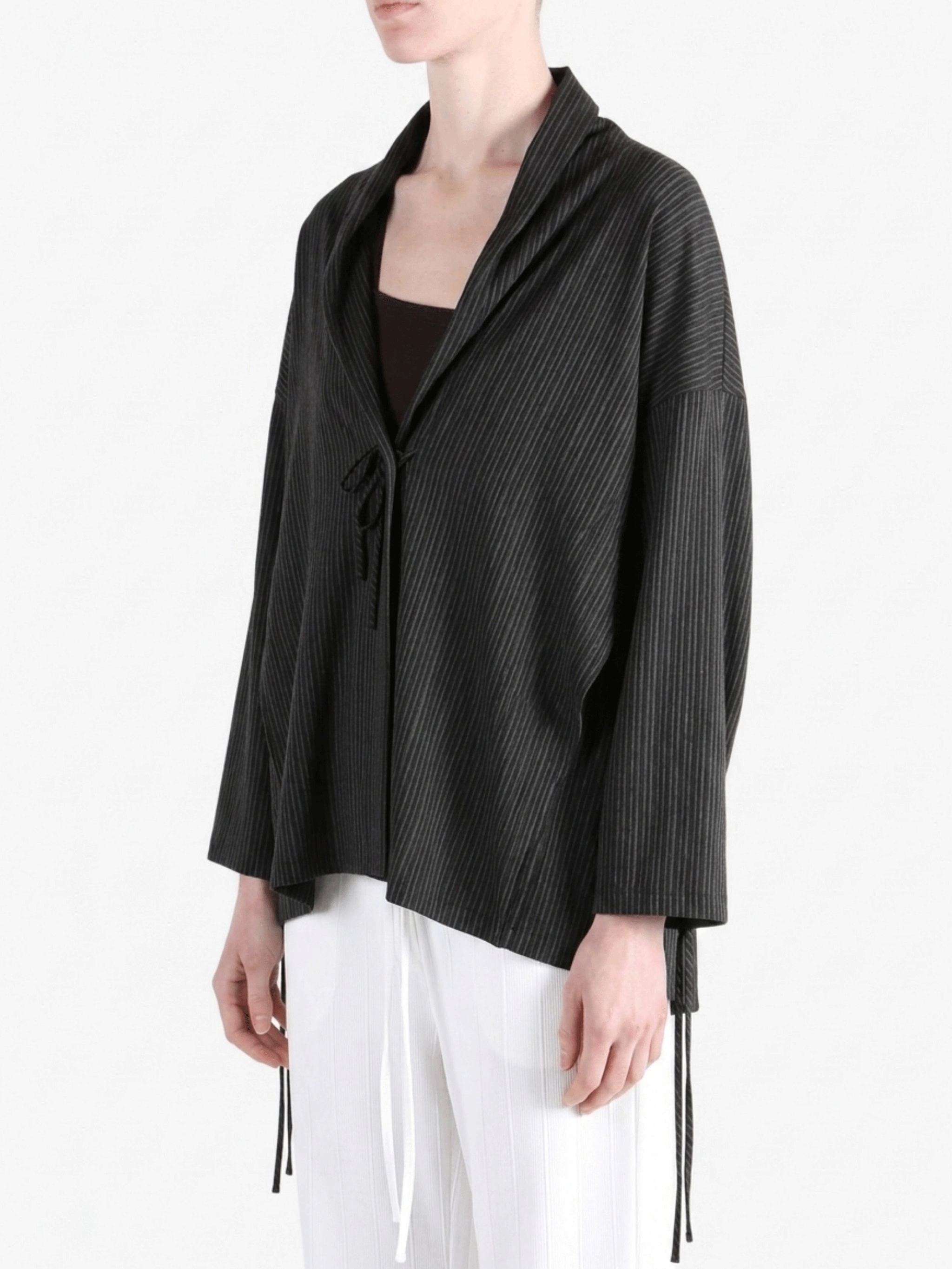 Black jackets worn by a person,showing the jackets fit