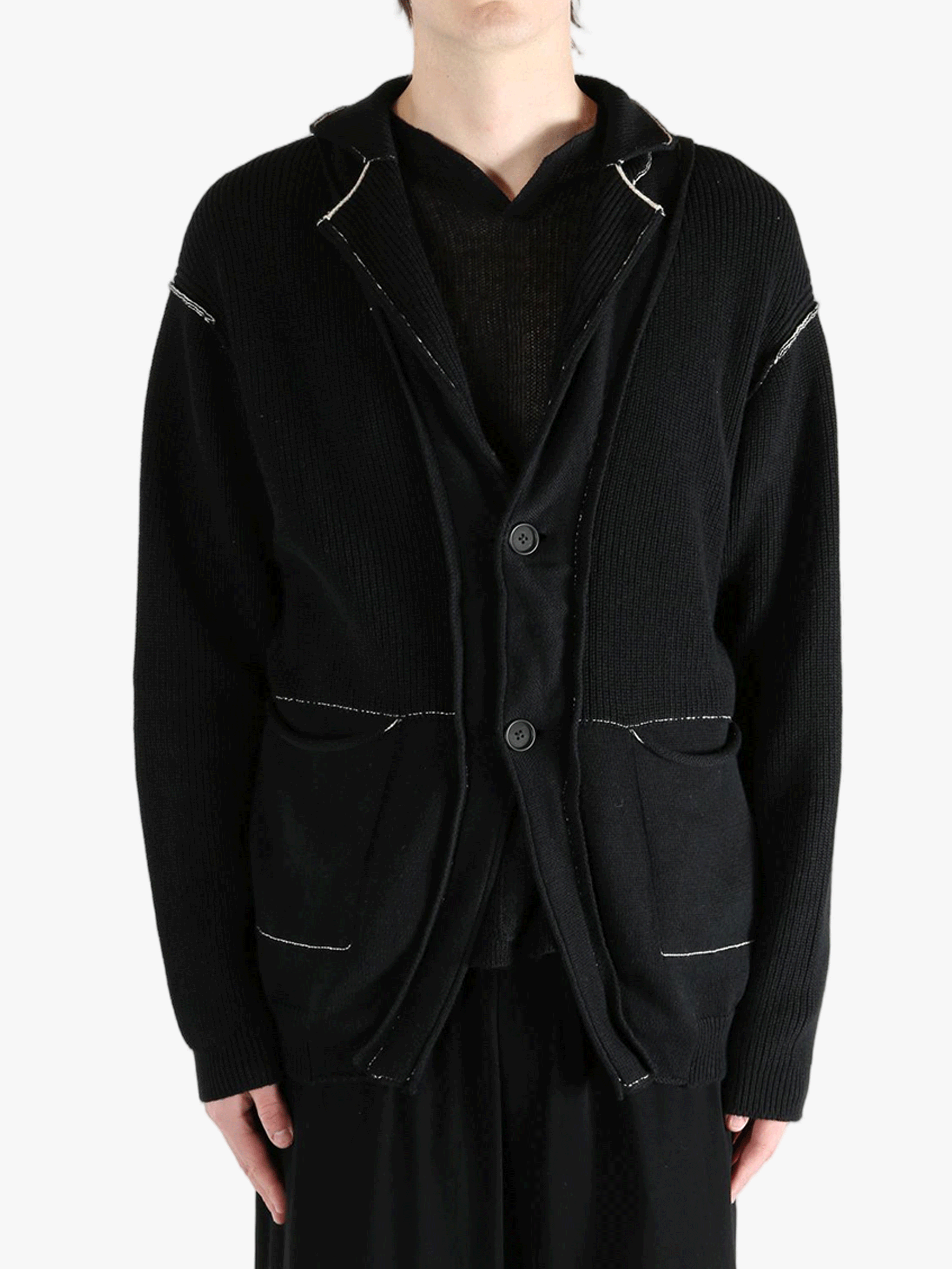 Black jacket worn by a person, showing the jacket's fit