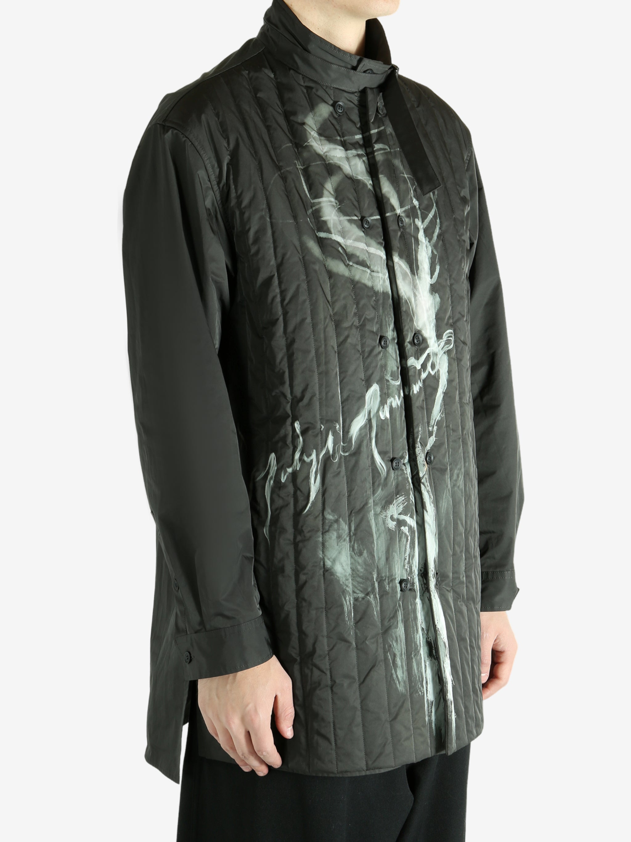 Black jacket worn by a person, showing the black's fit