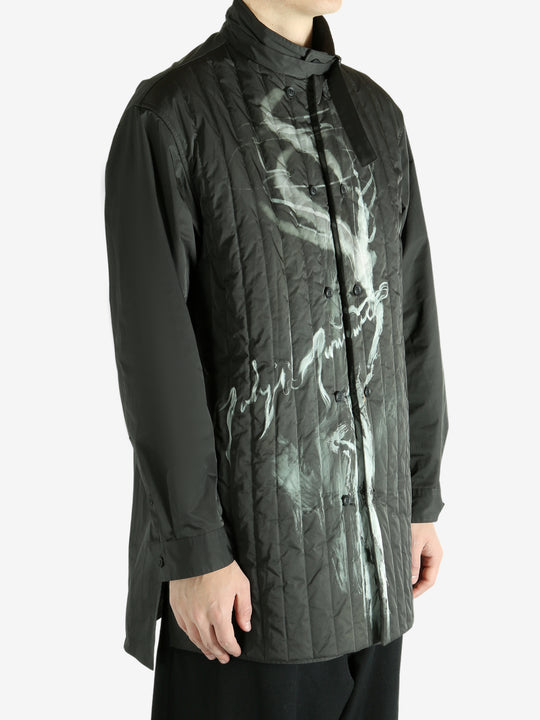 Black jacket worn by a person, showing the black's fit