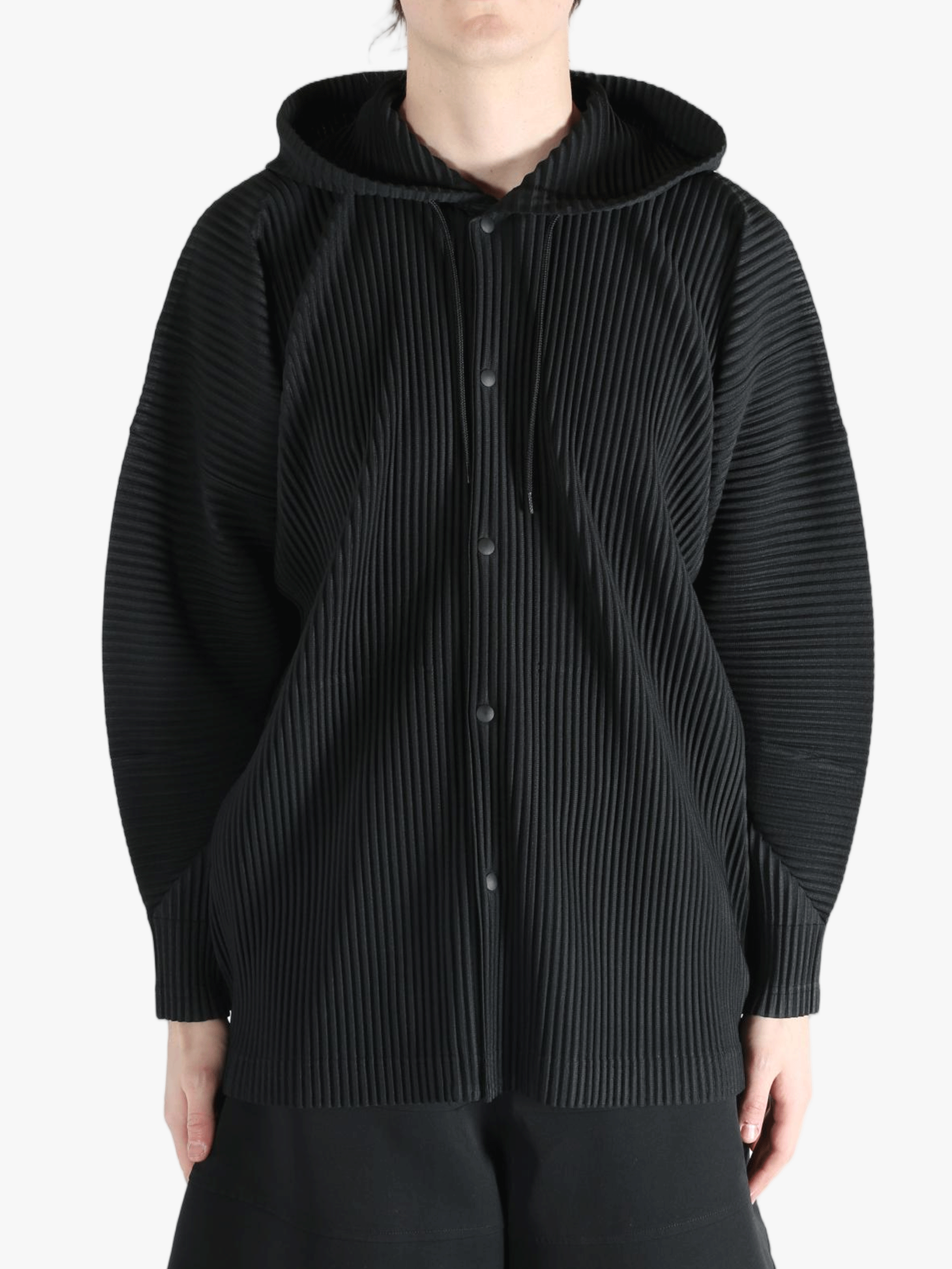 Black jacket worn by a person, showing the jacket's fit