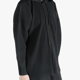 Black jacket worn by a person, showing the jacket's fit