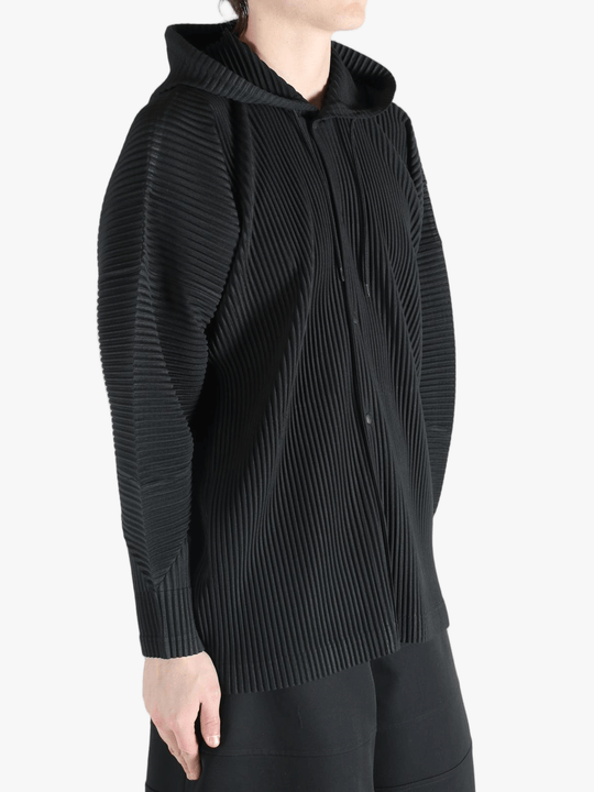 Black jacket worn by a person, showing the jacket's fit