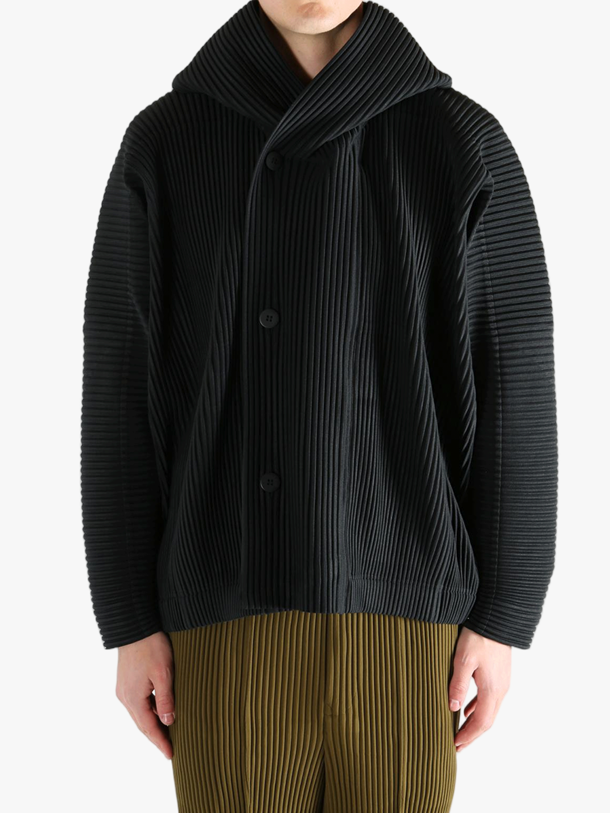 Black blouson worn by a person, showing the blouson's fit