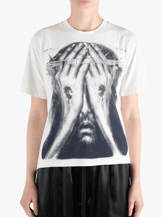 White t-shirt worn by a person, showing the t-shirt's fit