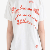 White t-shirt worn by a person, showing the t-shirt fit