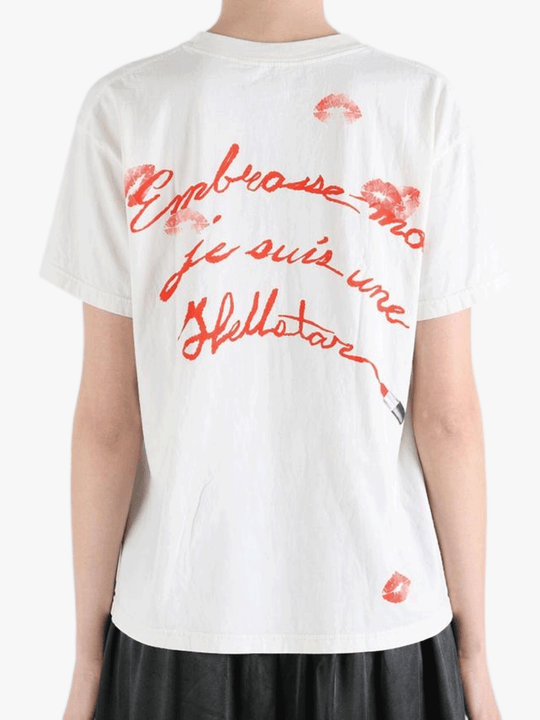 White t-shirt worn by a person, showing the t-shirt fit