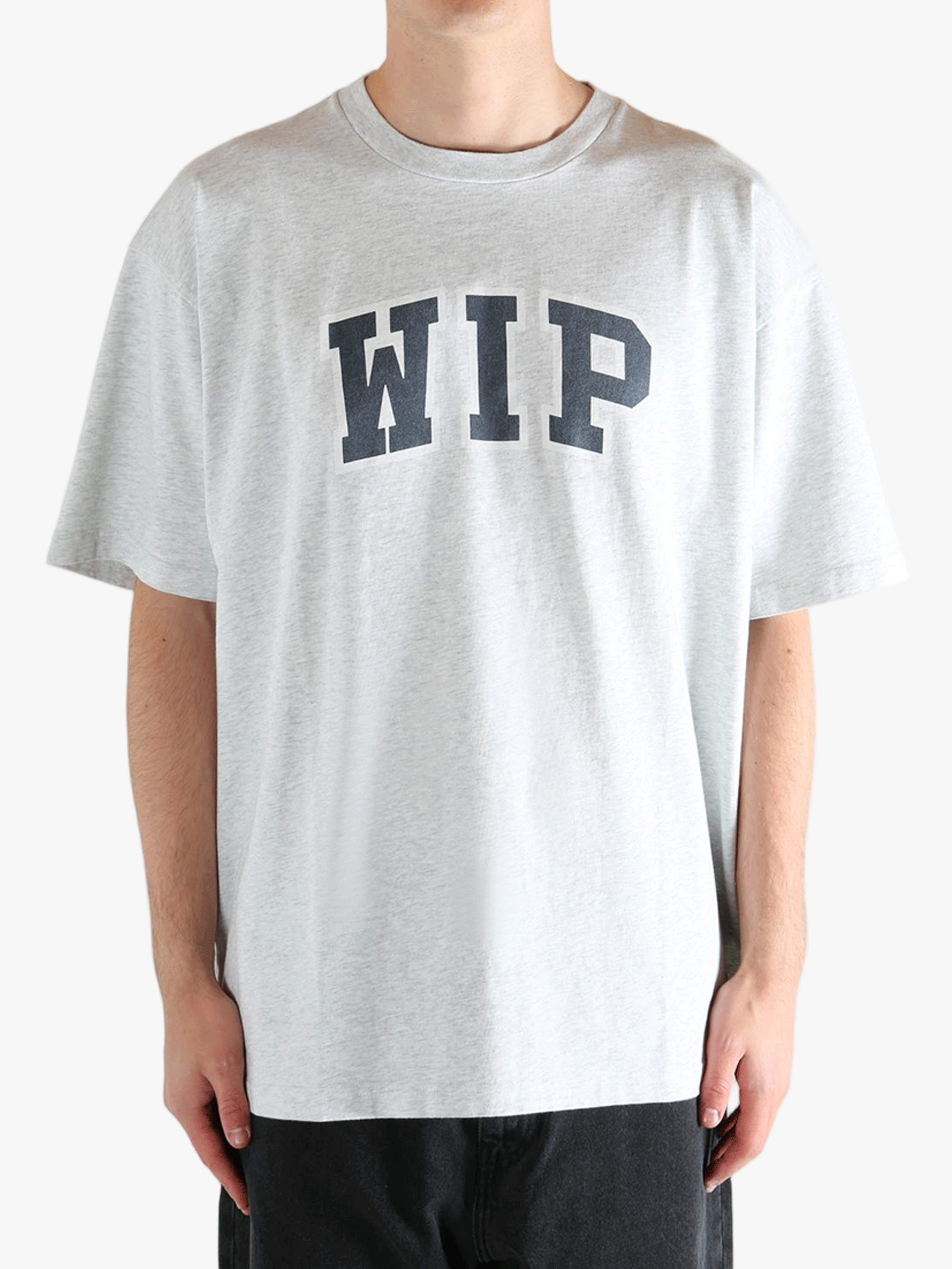 Grey t-shirt worn by a person, showing the t-shirt's fit