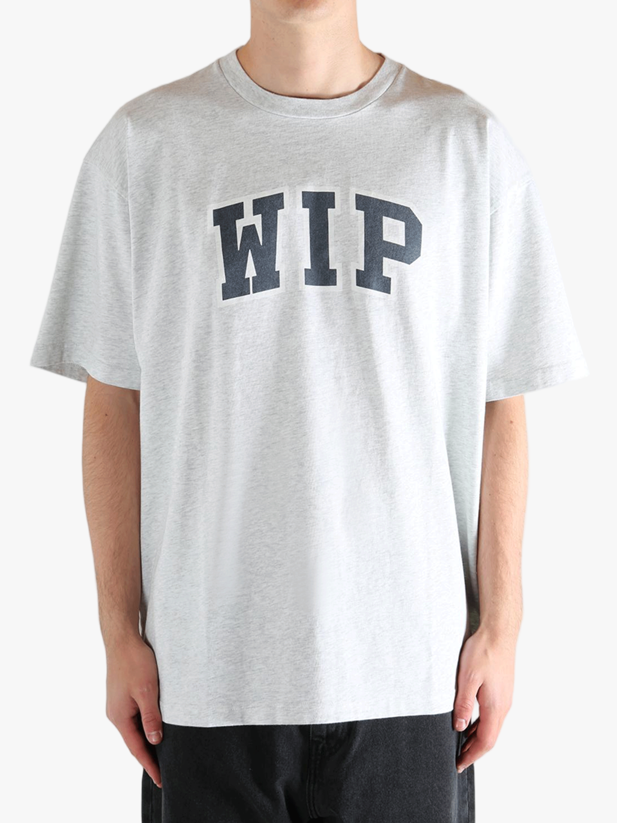 Grey t-shirt worn by a person, showing the t-shirt's fit