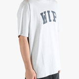 Grey t-shirt worn by a person, showing the t-shirt's fit