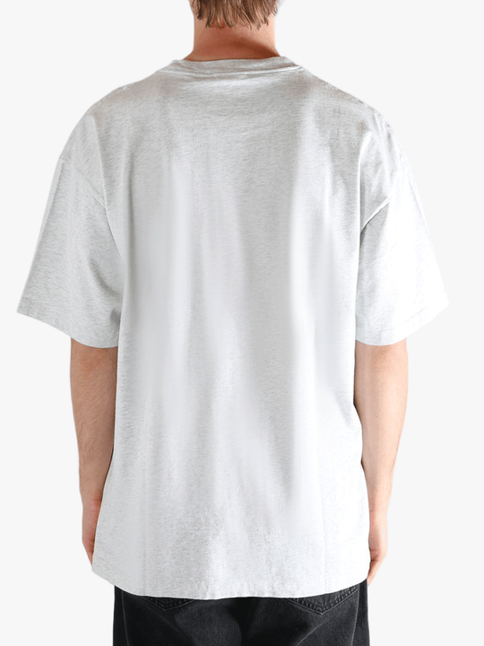 Grey t-shirt worn by a person, showing the t-shirt's fit