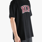 Black t-shirt worn by a person, showing the t-shirt's fit