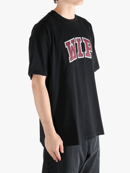 Black t-shirt worn by a person, showing the t-shirt's fit