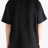 Black t-shirt worn by a person, showing the t-shirt's fit