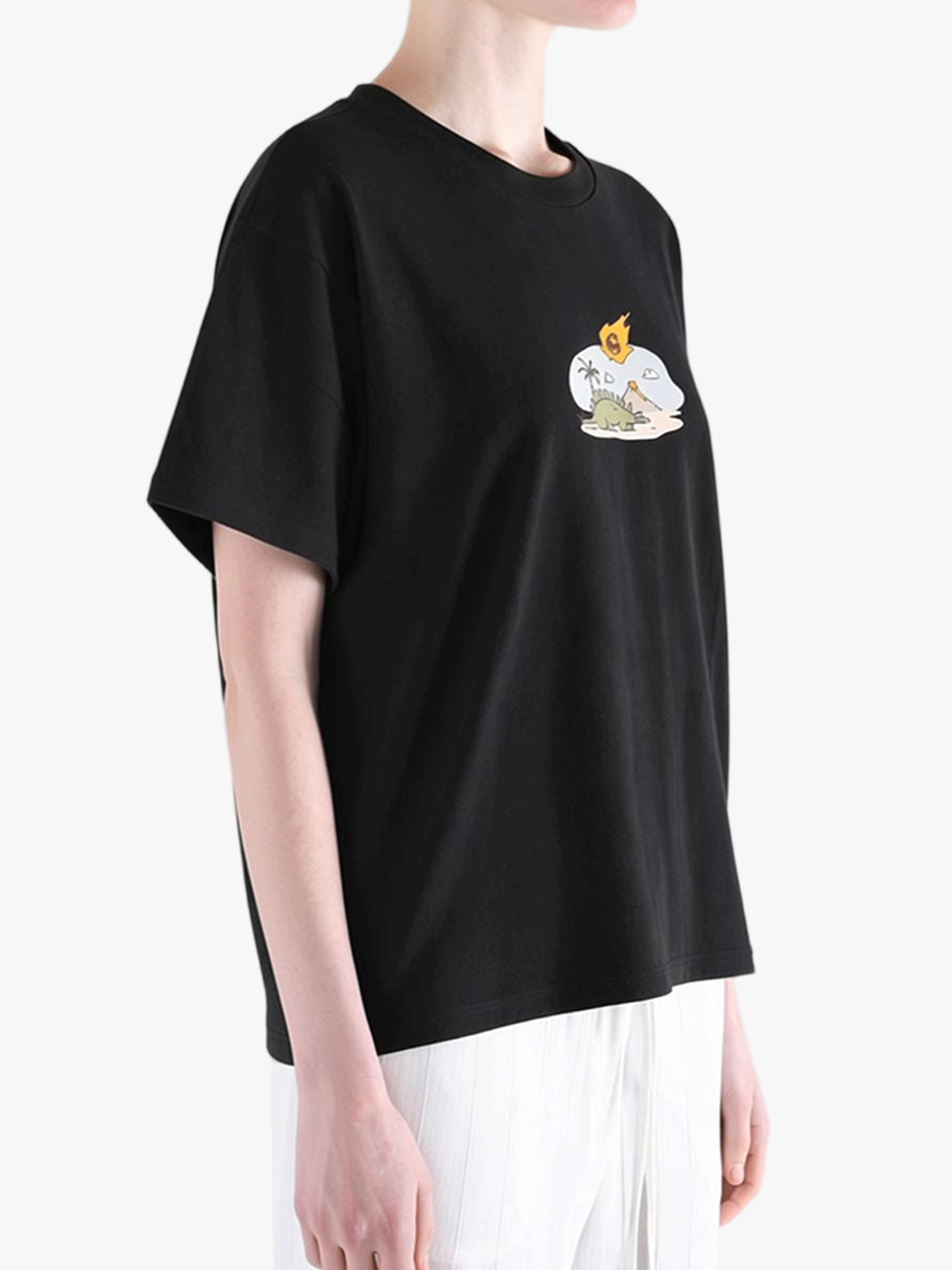 Black top worn by a person, showing the top fit