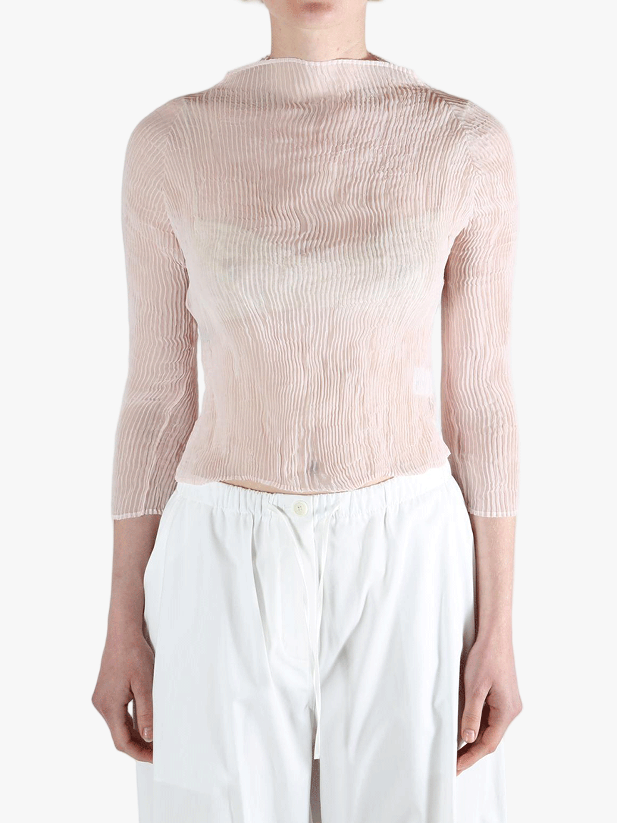 Pink shirt worn by a person, showing the shirt's fit
