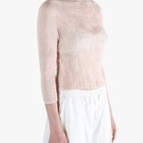 Pink shirt worn by a person, showing the shirt's fit