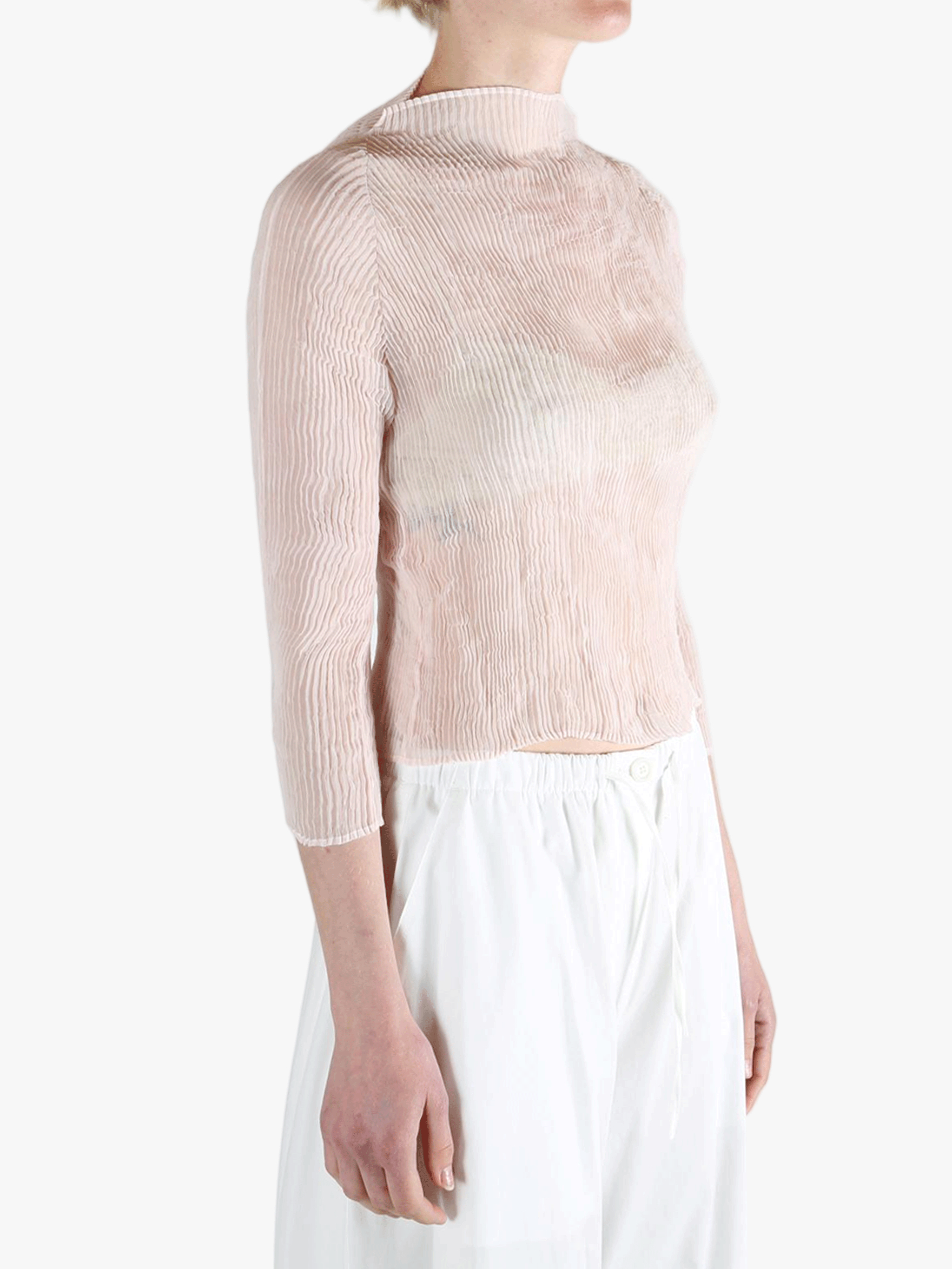 Pink shirt worn by a person, showing the shirt's fit