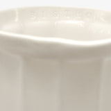Detail of JINJIN PARIS French Cup Large with subtle ‘Bistro’ embossing along the interior rim.