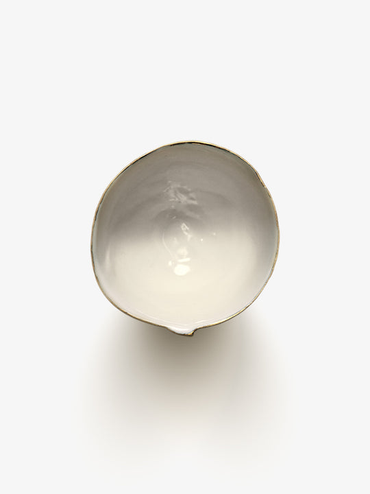 Top view of JINJIN PARIS Golden Rim Coffee Cup Medium with asymmetrical circular opening and glazed interior.