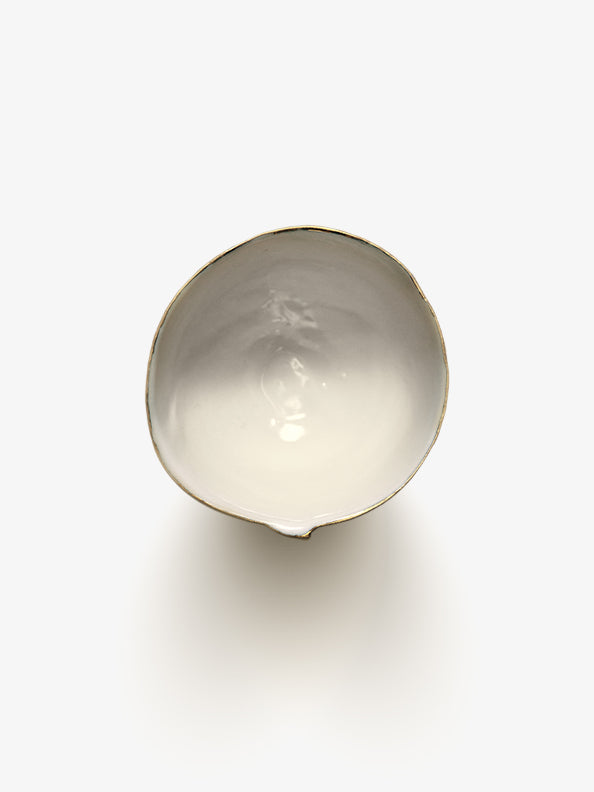 Top view of JINJIN PARIS Golden Rim Coffee Cup Medium with asymmetrical circular opening and glazed interior.