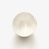 Top view of JINJIN PARIS Golden Rim French Cup with glazed interior and softly irregular circular opening.