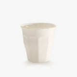JINJIN PARIS Golden Rim French Cup in ivory porcelain, angled view with ramekin fluted exterior and hand-finished gold rim.