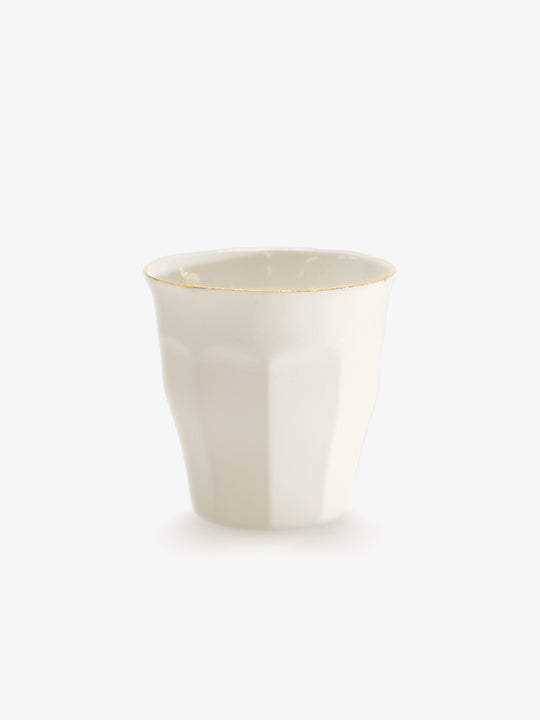 JINJIN PARIS Golden Rim French Cup in ivory porcelain, angled view with ramekin fluted exterior and hand-finished gold rim.
