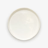 Top view of JINJIN PARIS Golden Rim Shallow Plate Large in glazed ivory porcelain with circular silhouette and gold edging.