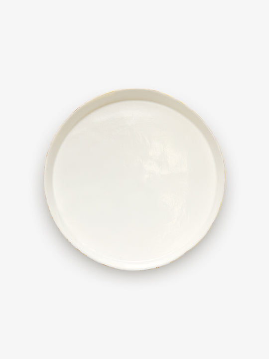 Top view of JINJIN PARIS Golden Rim Shallow Plate Large in glazed ivory porcelain with circular silhouette and gold edging.