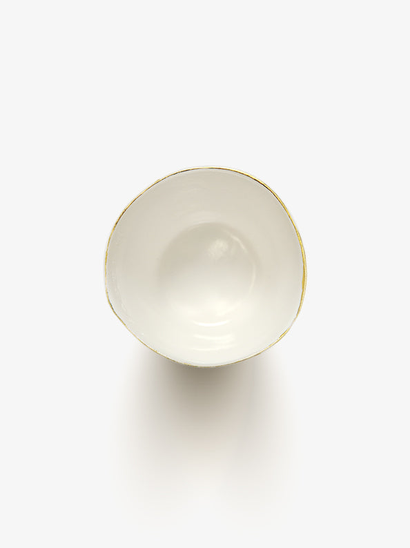 Top view of JINJIN PARIS Golden Rim Teacup Medium with glazed interior and asymmetrical circular opening.