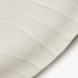 Detail of JINJIN PARIS Leaf Oval Plate with embossed leaf vein texture on glazed porcelain surface.