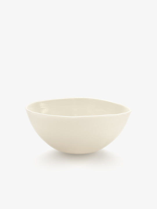 JINJIN PARIS Pure White Bowl in ivory porcelain, angled view with organic silhouette and softly irregular rim.