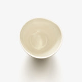 Top view of JINJIN PARIS Pure White Deep Cup in glazed ivory porcelain with circular opening.