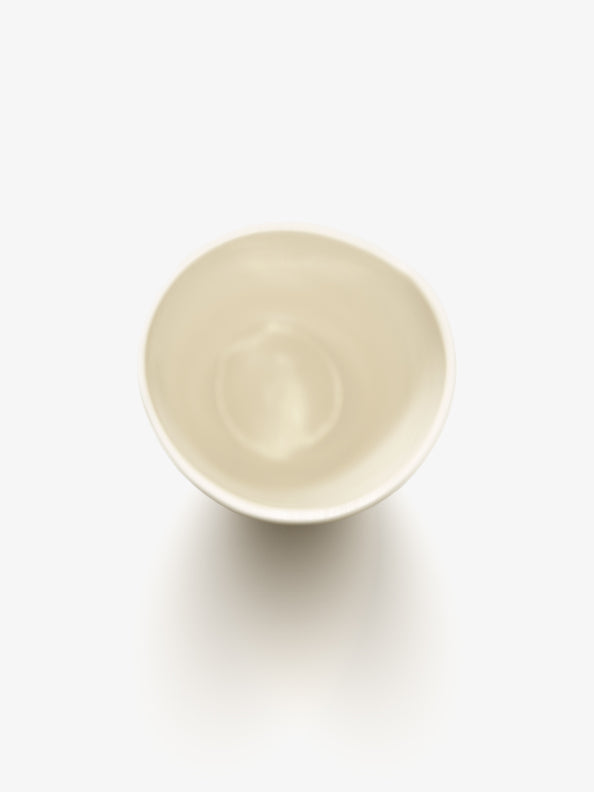 Top view of JINJIN PARIS Pure White Deep Cup in glazed ivory porcelain with circular opening.