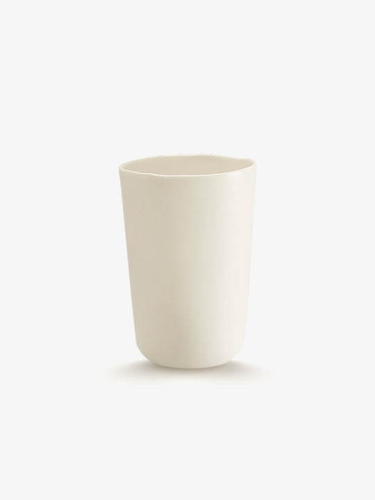 JINJIN PARIS Pure White Deep Cup in ivory porcelain, side view with organic silhouette and softly irregular rim.