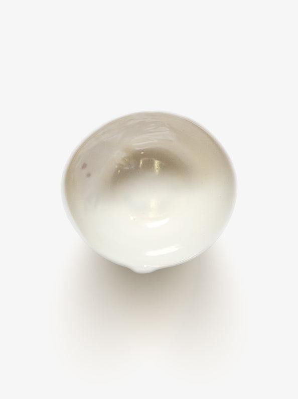 Top view of JINJIN PARIS Leaf Whisper Teacup with glazed interior and softly asymmetrical opening.