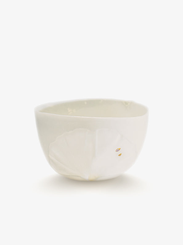 JINJIN PARIS Leaf Whisper Teacup in ivory porcelain, angled view with botanical relief texture and gold leaf accents.
