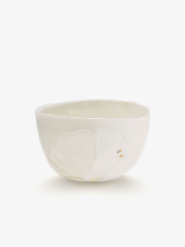 JINJIN PARIS Leaf Whisper Teacup in ivory porcelain, angled view with botanical relief texture and gold leaf accents.