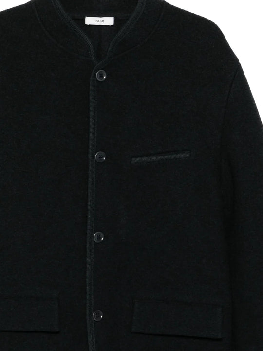 Close up of black jacket,showing texture of the wool fabric