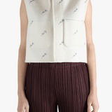 White jacket worn by a person, showing the jacket fit