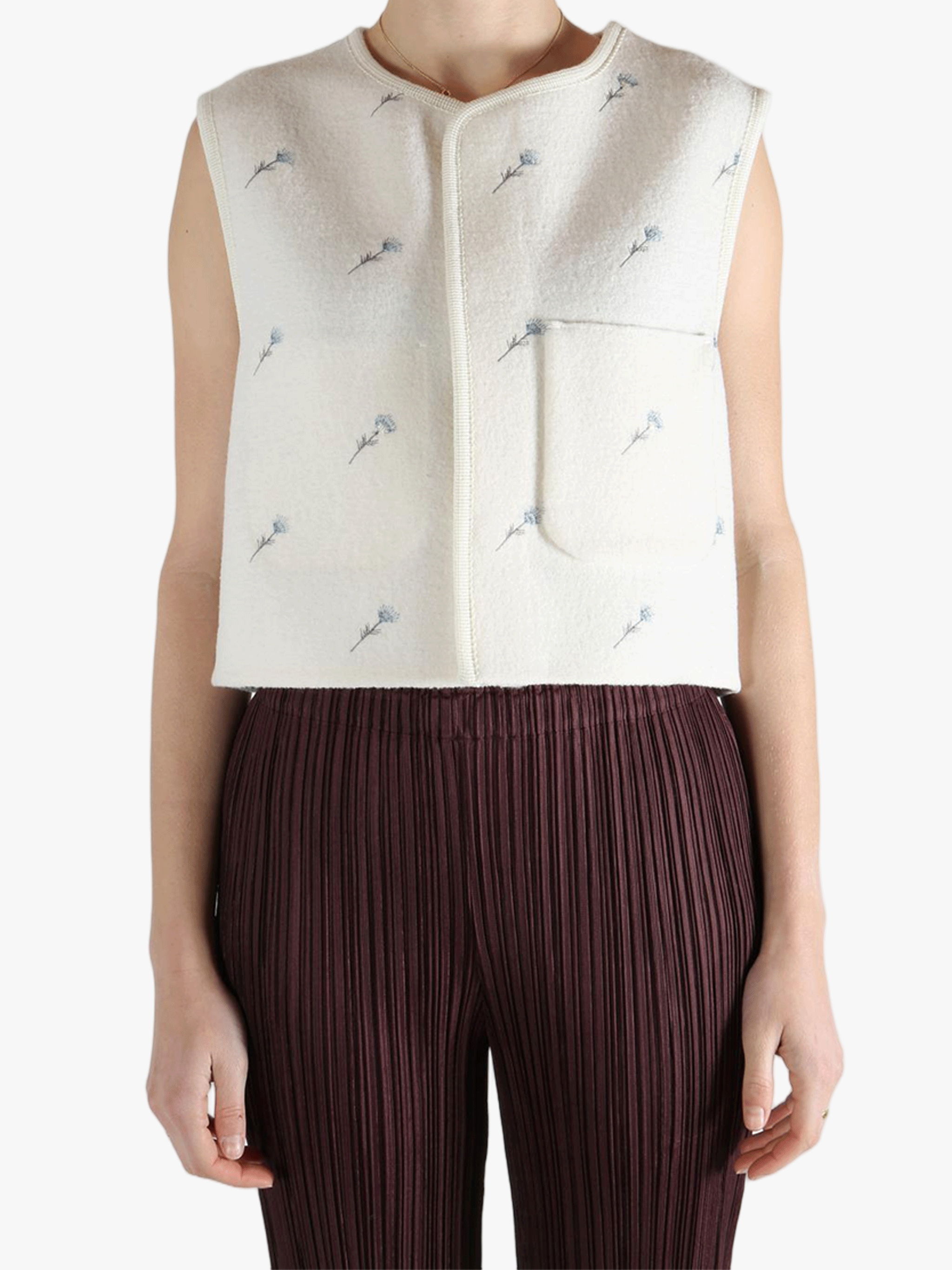 White jacket worn by a person, showing the jacket fit