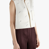 White jacket worn by a person, showing the jacket fit