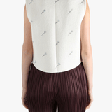 White jacket worn by a person, showing the jacket fit