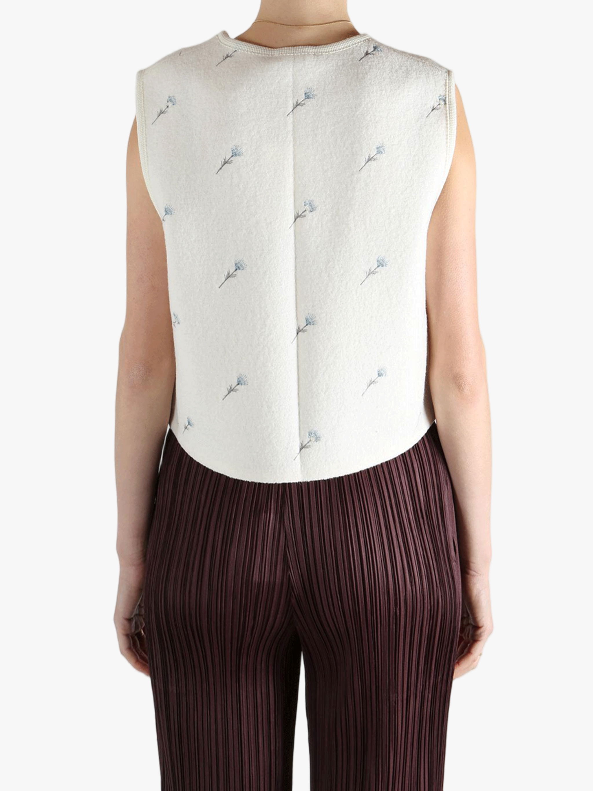 White jacket worn by a person, showing the jacket fit