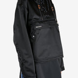 Black jacket worn by a person, showing the jacket's fit