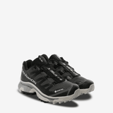 Black sneakers, front view
