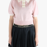 Pink top,worn by a person, showing the top fit