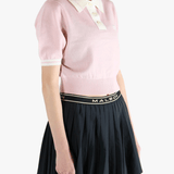 Pink top,worn by a person, showing the top fit